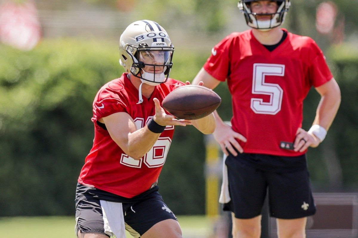 Jun 2, 2022; New Orleans Ian Book (16) works on passing drills during organized team activities at the Saints Training Facility. Mandatory Credit: Stephen Lew-USA TODAY